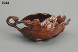 Toad in folded gingko leaf